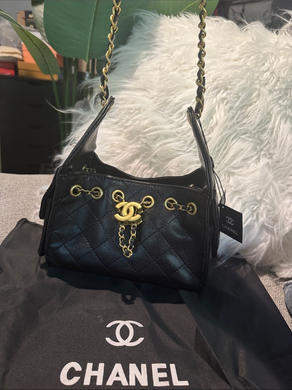 Chanel Black Quilted Shoulder Bag with Gold Chain and CC Toggle